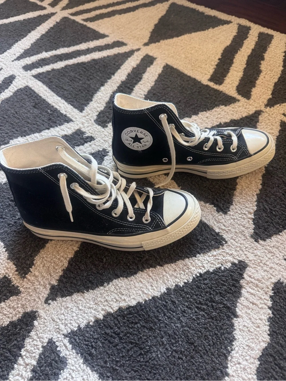 Black High-Top Converse with off white Accents